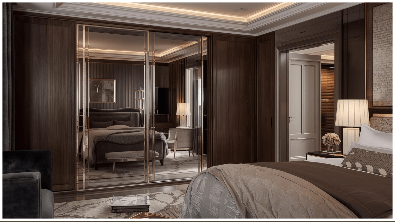 Sliding vs Hinged Doors Wardrobes UK: Which is best? 11 Luxury UK bedroom interior featuring a mirrored wardrobe with elegant design, plush bedding, warm accent lighting, high-end furniture photography style